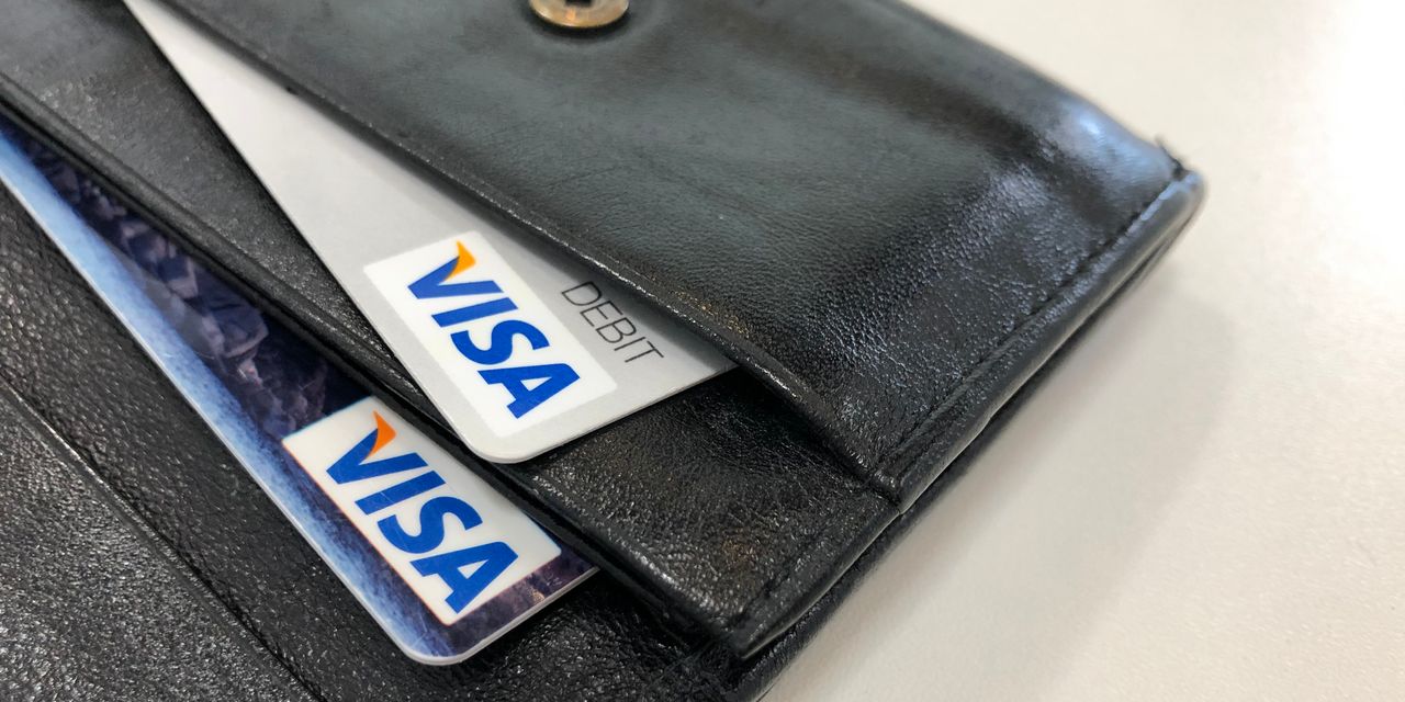 visa-tops-earnings-expectations,-boosts-dividend